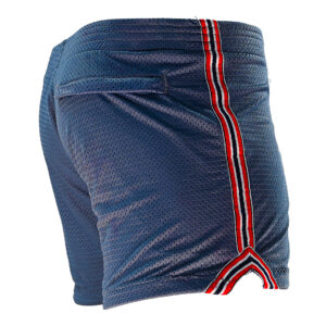 WOOF Freeball Mesh Field Shorts, Athletic Fit (Navy) with bulge enhancement, featuring a red and white stripe running down each side, shown from the back angle, isolated on a white background.